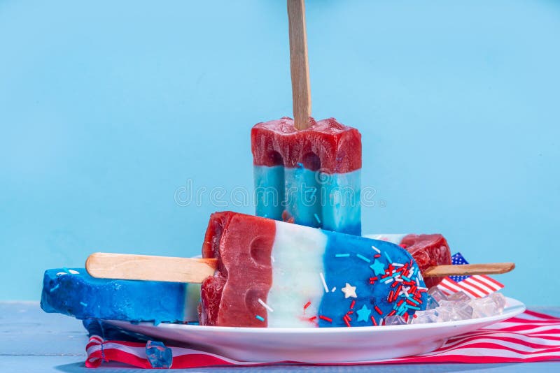 Red, white and blue ice pops. Patriotic USA lollypops ice cream for july 4 party or bbq picnic, tasty popsicles with fruit berry flavours. Red, white and blue ice pops. Patriotic USA lollypops ice cream for july 4 party or bbq picnic, tasty popsicles with fruit berry flavours