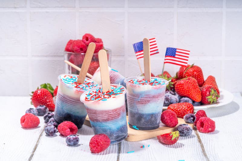 Red, white and blue ice pops. Patriotic USA lollypops ice cream for july 4 party or bbq picnic, tasty popsicles with fruit berry flavours. Red, white and blue ice pops. Patriotic USA lollypops ice cream for july 4 party or bbq picnic, tasty popsicles with fruit berry flavours