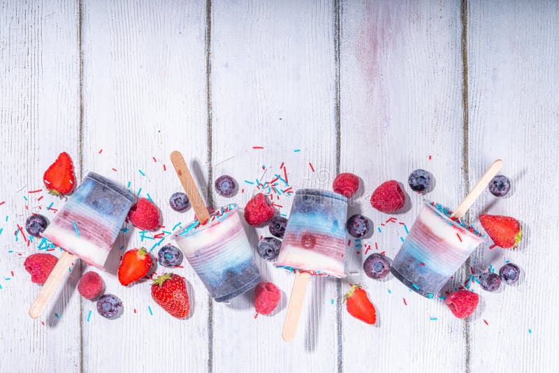 Red, white and blue ice pops. Patriotic USA lollypops ice cream for july 4 party or bbq picnic, tasty popsicles with fruit berry flavours. Red, white and blue ice pops. Patriotic USA lollypops ice cream for july 4 party or bbq picnic, tasty popsicles with fruit berry flavours