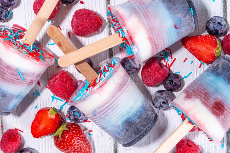 Red, white and blue ice pops. Patriotic USA lollypops ice cream for july 4 party or bbq picnic, tasty popsicles with fruit berry flavours. Red, white and blue ice pops. Patriotic USA lollypops ice cream for july 4 party or bbq picnic, tasty popsicles with fruit berry flavours