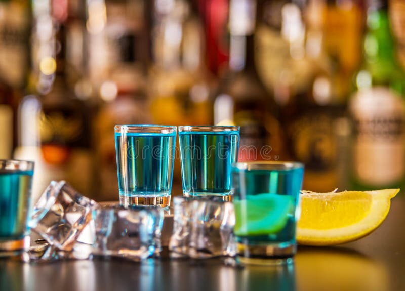 Glasses With Blue Green And Red Kamikaze Glamorous Drinks Mixed Drink  Poured Into Shot Glasses Stock Photo - Download Image Now - iStock
