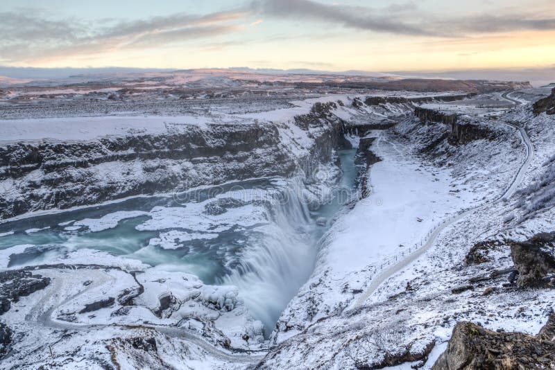 Por do sol congelado de Gullfoss foto de stock Por do sol congelado de Gullfoss foto de stock