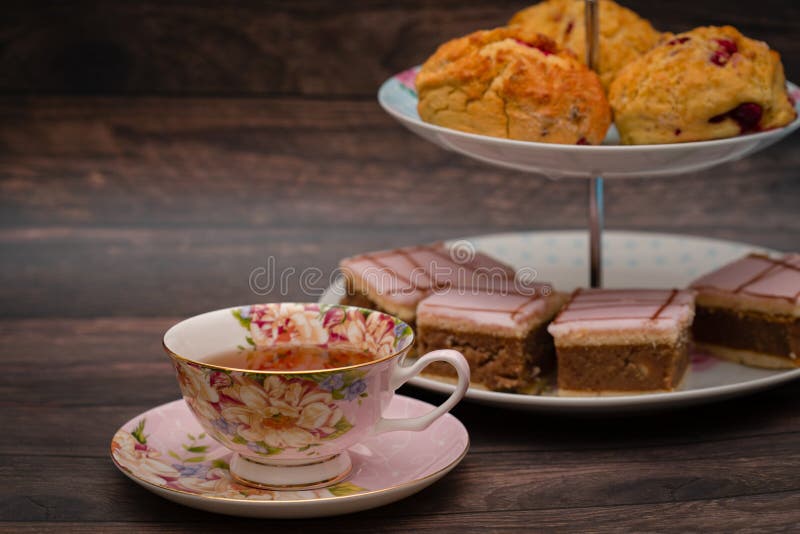Pretty Tea Cups and Cake on the Cake Stand Stock Photo Image of plate