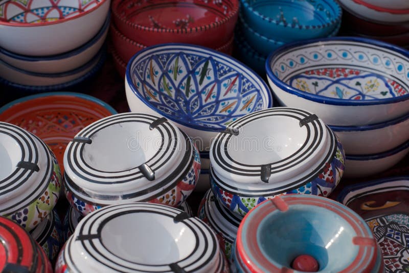 Pottery, african styled China ware at a market with different colors, Tunisia. Pottery, african styled China ware at a market with different colors, Tunisia