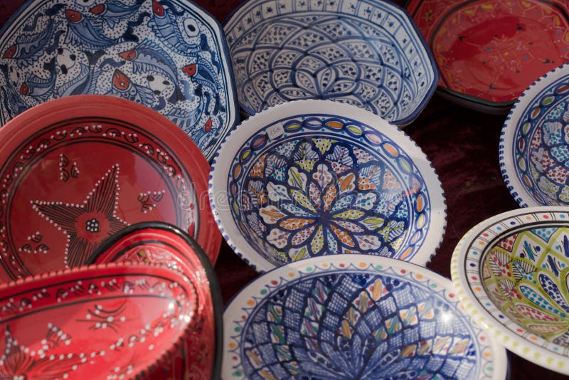 Pottery, african styled China ware at a market with different colors, Tunisia. Pottery, african styled China ware at a market with different colors, Tunisia