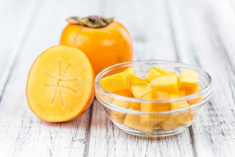 Porción de frutas del caqui fotografía de archivo libre de regalías Porción de frutas del caqui fotografía de archivo libre de regalías