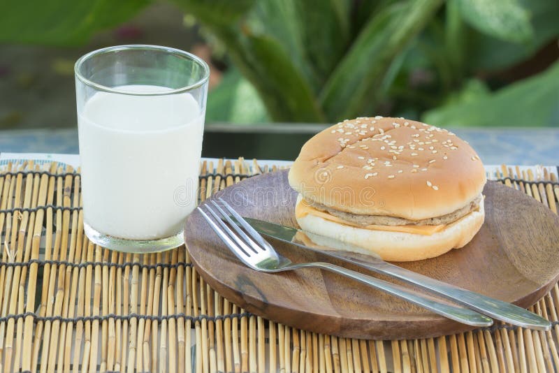 Pork Cheese Burger with Fresh Milk royalty free stock photos
