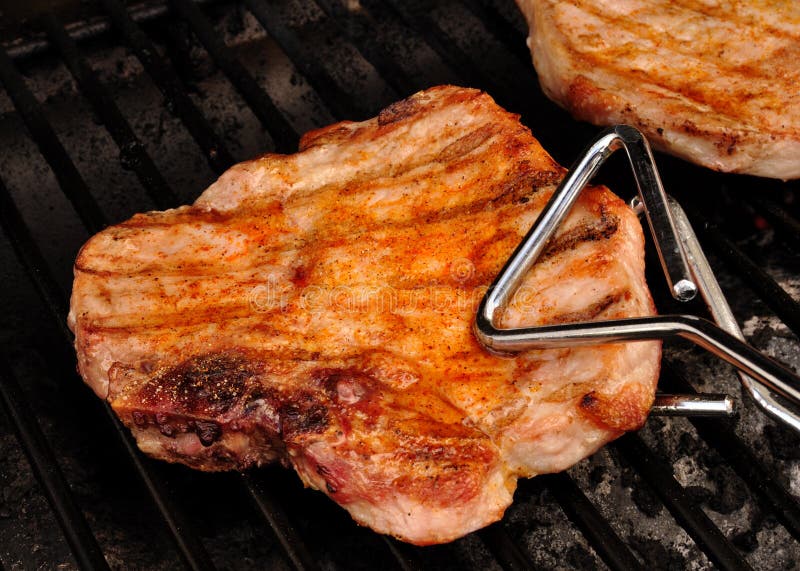 A Pork Chop on the grill