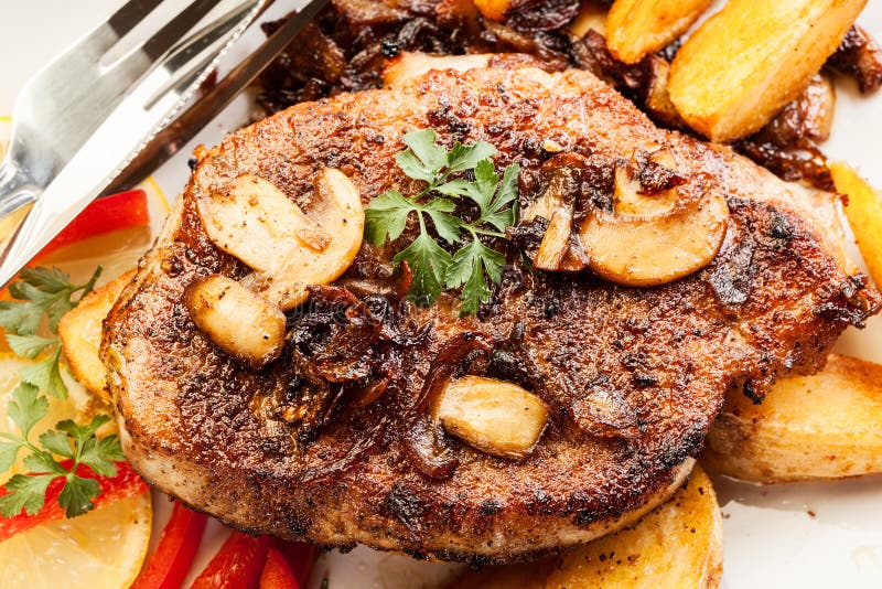 Pork Chop with Mushrooms and Chips Stock Photo - Image of dinner, grill ...