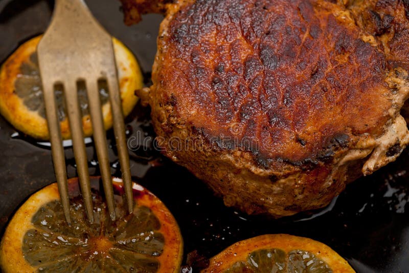 Pork Chop Seared On Iron Skillet