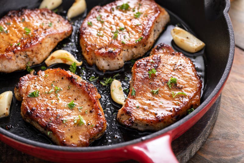 Pork Chops Cooked in a Cast Iron Pan Stock Photo - Image of pork ...
