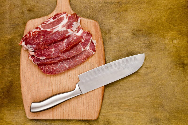 Pork on a cutting board stock photo. Image of wood, pork 69813852