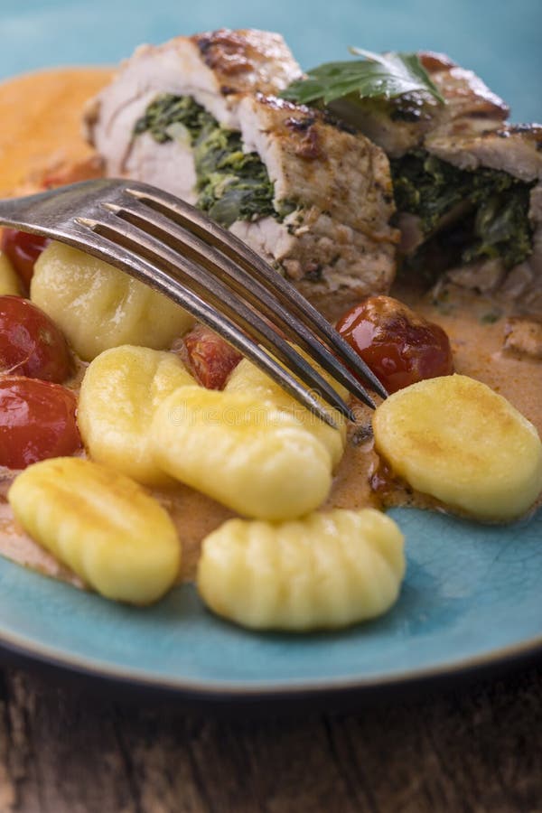 Pork fillet with gnocchi stock image. Image of roast 219729711