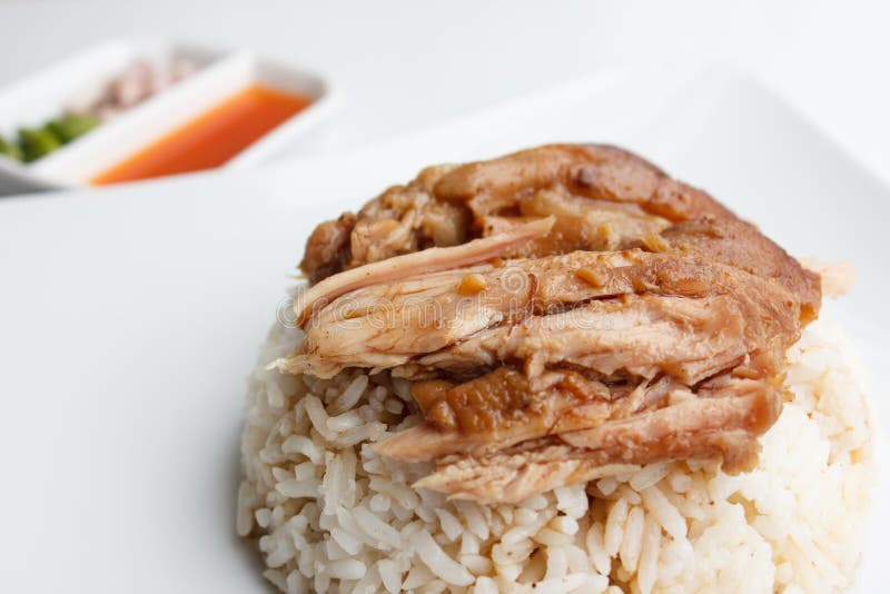 Pork leg with rice close up on white background stock photo Pork leg with rice close up on white background stock photo