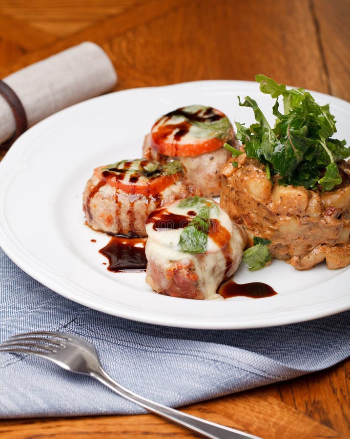 Pork Medallions with sauce stock photo. Image of sirloin 23113224