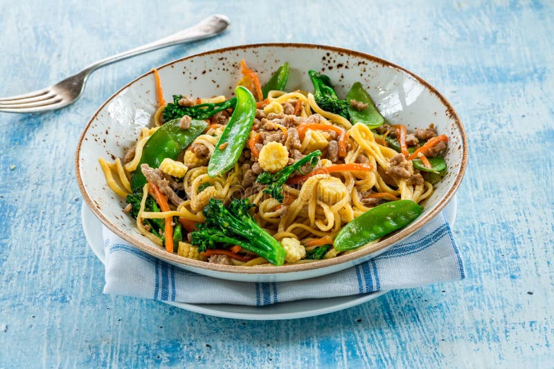 Pork noodle stir-fry stock image. Image of cooking, main - 176587691