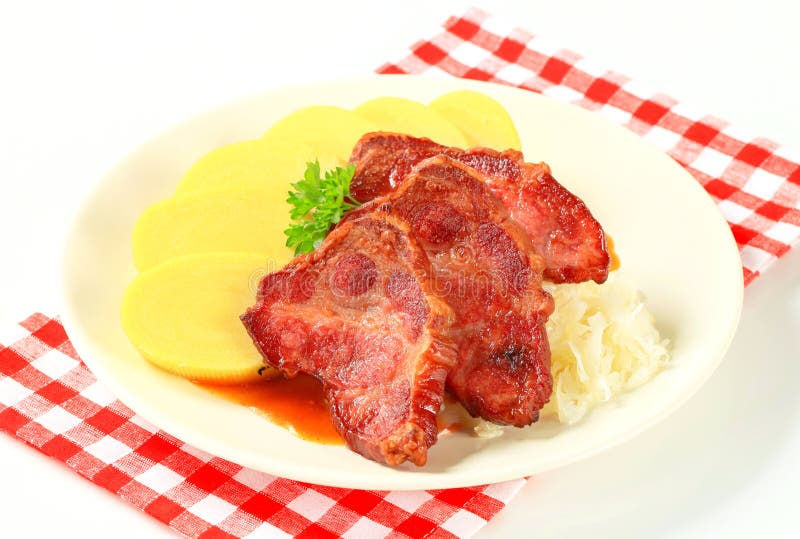 Pork with potato dumplings and sauerkraut