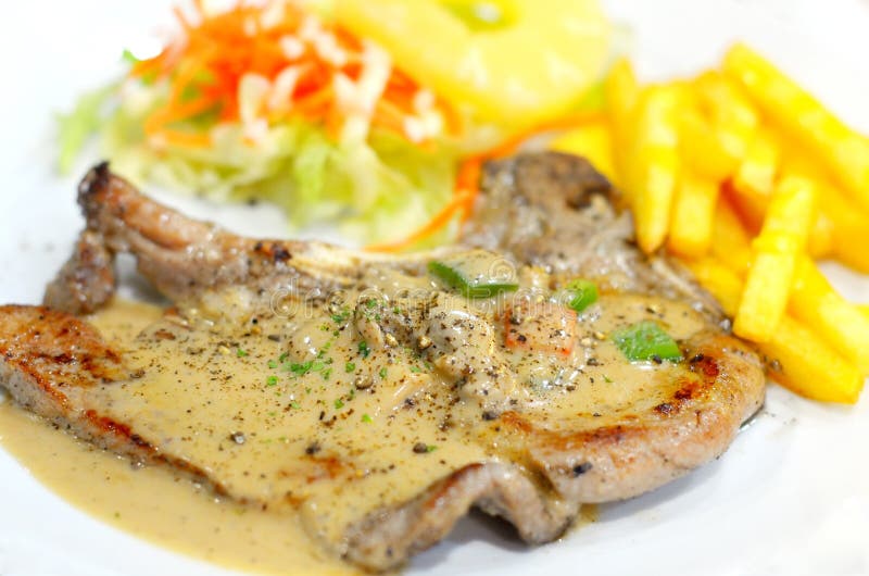 Pork Steak with Pepper Sauce Stock Photo - Image of salad, meal: 44405476