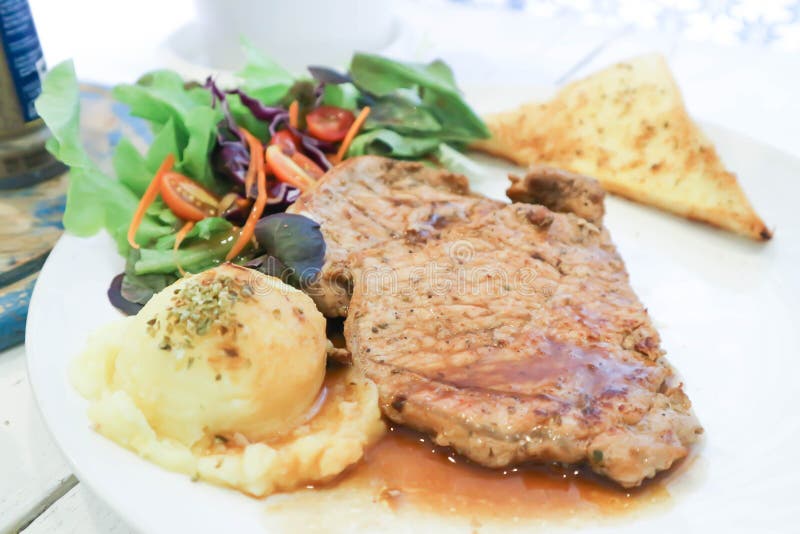 Pork Steak or Pork Rib Steak , Pork Chop and Mashed Potato Stock Photo