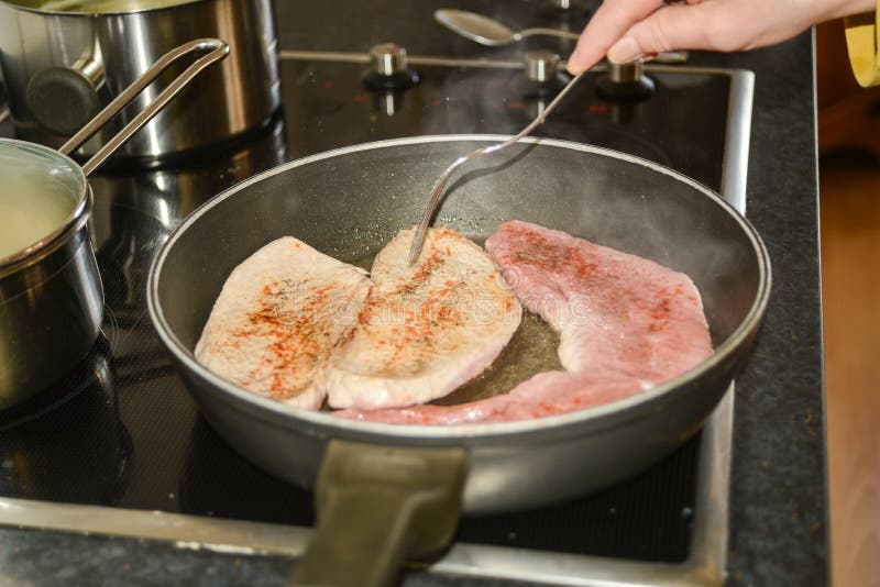 Pork Steaks on a Frying Pan Stock Photo Image of electricity, heat