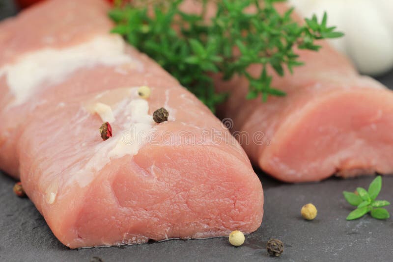 Pork tenderloin with herbs stock photo. Image of spices 28158228