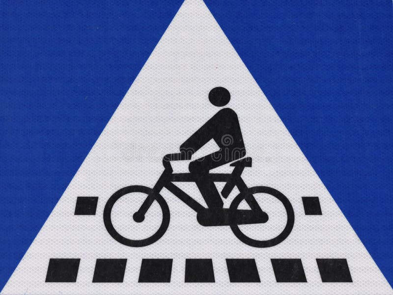 Pormenores de um sinal de passagem de peões e bicicletas