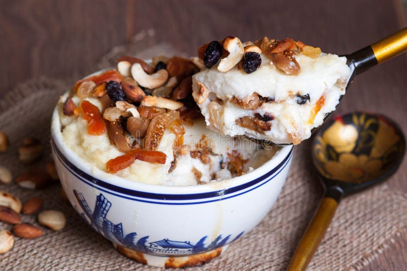 Porridge with Dried Fruit and Nuts in a Spoon Stock Image Image of grains, semolina 56884229