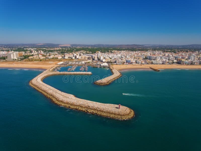 Port and beaches of Quarteira, view from sky.