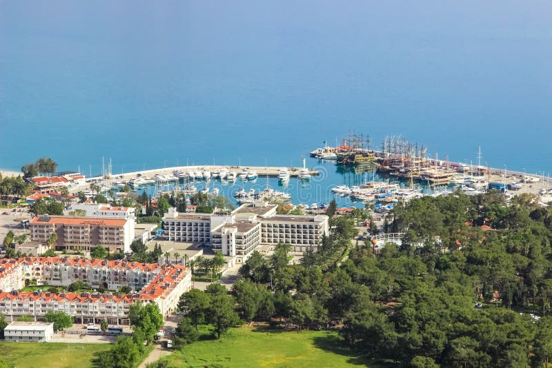 Port Marina Kemer, Hotel Ozkaymak Marina 5* and other buildings view from mountain, Turkey, Kemer, April 29, 2019 royalty free stock photos Port Marina Kemer, Hotel Ozkaymak Marina 5* and other buildings view from mountain, Turkey, Kemer, April 29, 2019 royalty free stock photos