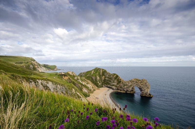 Porta di Durdle sulla costa giurassica di Dorset fotografia stock libera da diritti Porta di Durdle sulla costa giurassica di Dorset fotografia stock libera da diritti