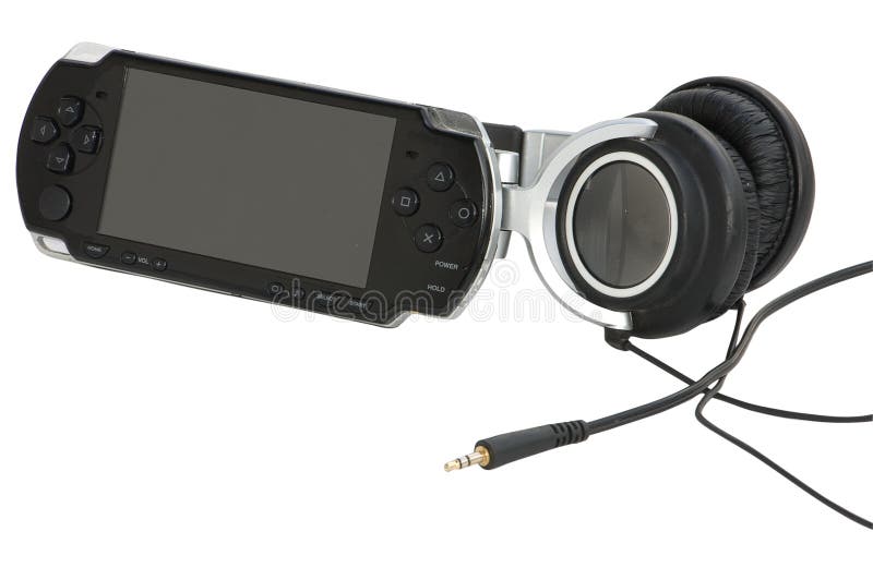 Portable game station with large headphones stock photography