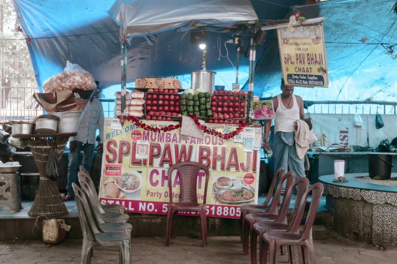 A portable Pav bhaji fast food market stall selling Maharashtra veg food like Bhaji-pav, Vada pav, soft bread rolls, panipuri, royalty free stock photo A portable Pav bhaji fast food market stall selling Maharashtra veg food like Bhaji-pav, Vada pav, soft bread rolls, panipuri, royalty free stock photo