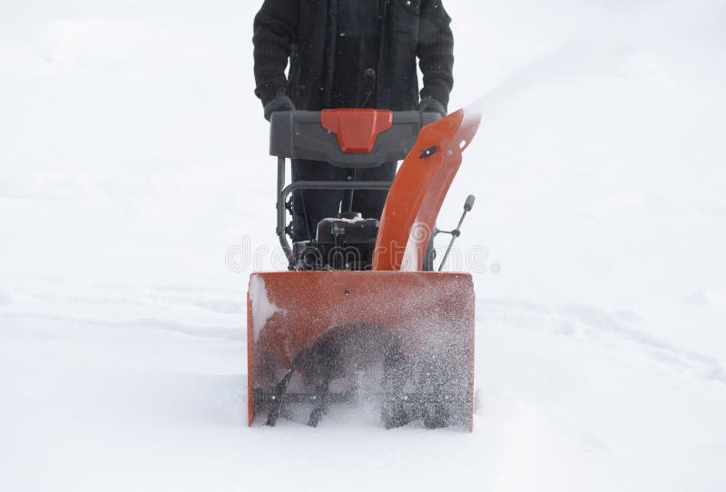 A Portable Snow Blower Powered by Gasoline. Snow Removal in Winter