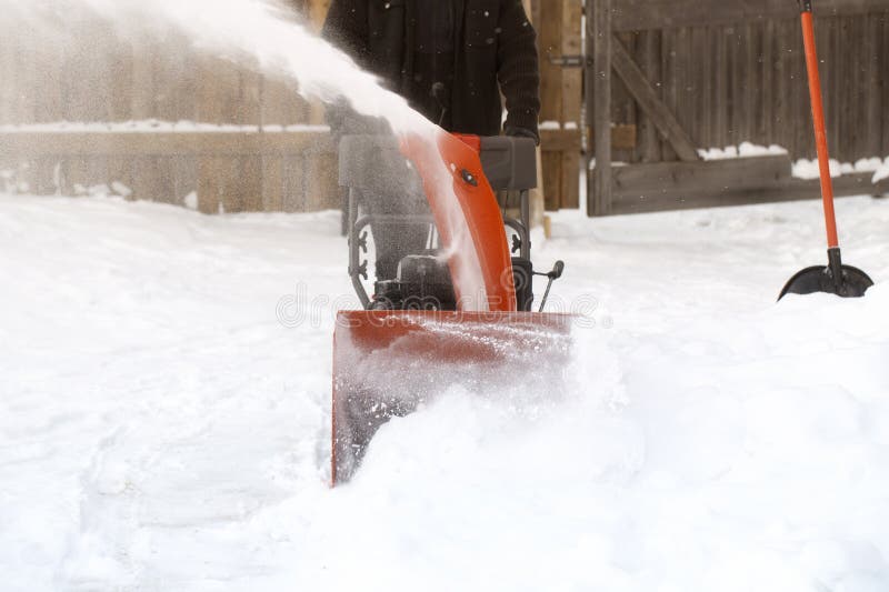 A Portable Snow Blower Powered by Gasoline. Snow Removal in Winter