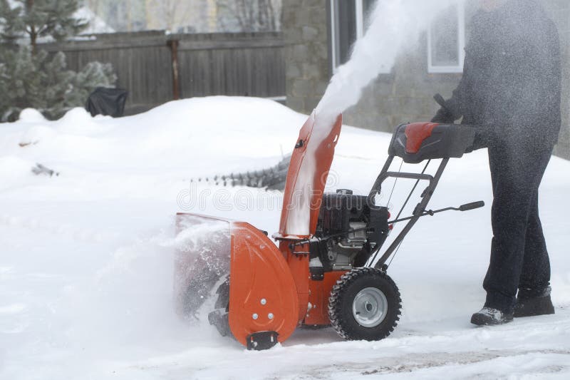 A Portable Snow Blower Powered by Gasoline. Snow Removal in Winter