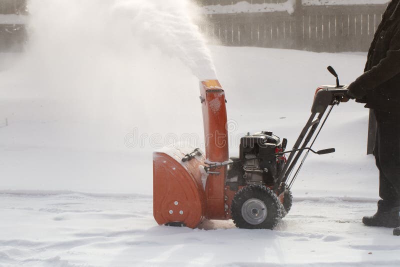 A Portable Snow Blower Powered by Gasoline. Snow Removal in Winter