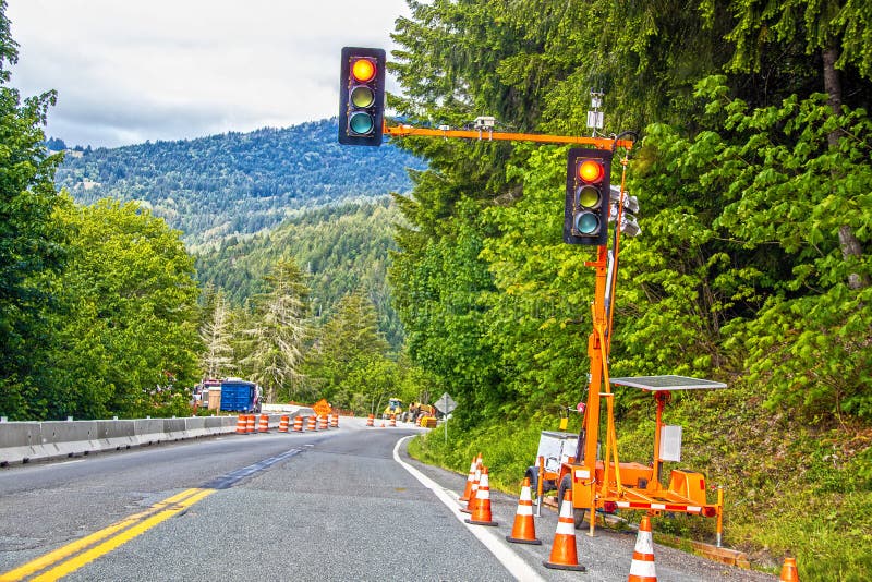 Portable Solar Powered Traffic Light at Construction Site in Tree