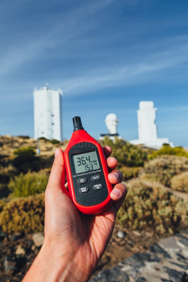 Portable Thermometer in Hand Measuring Outdoor Air Temperature and Humidity  Stock Photo - Image of instrument, closeup: 119112844