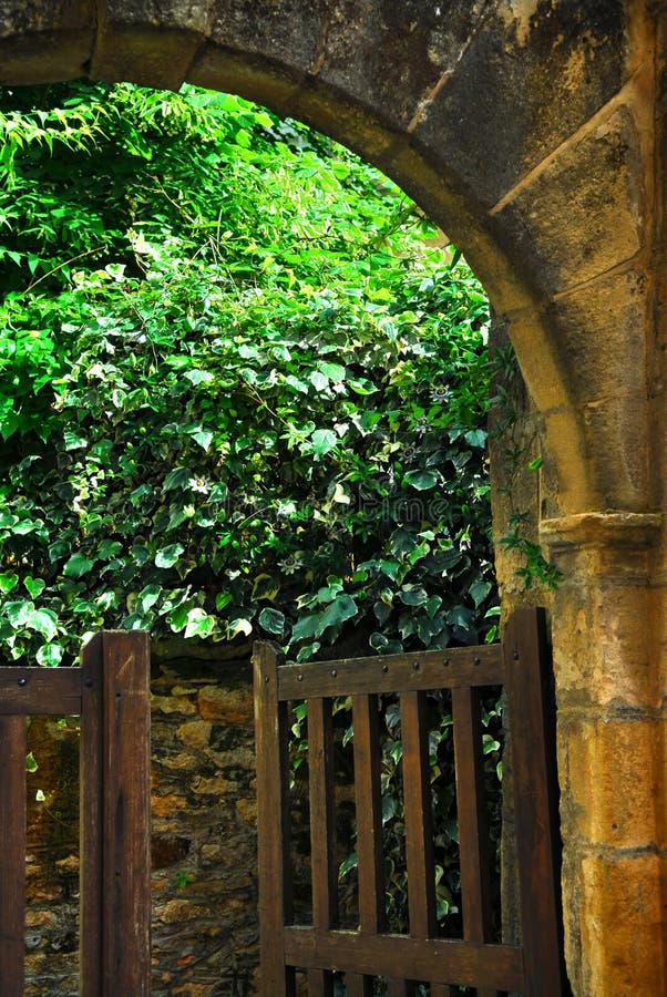 Garden gate in medieval town of Sarlat, Dordogne region, France. Garden gate in medieval town of Sarlat, Dordogne region, France