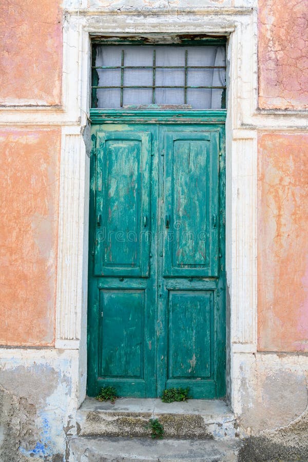 Ornate Traditional green door in Sicily, Italy. Ornate Traditional green door in Sicily, Italy