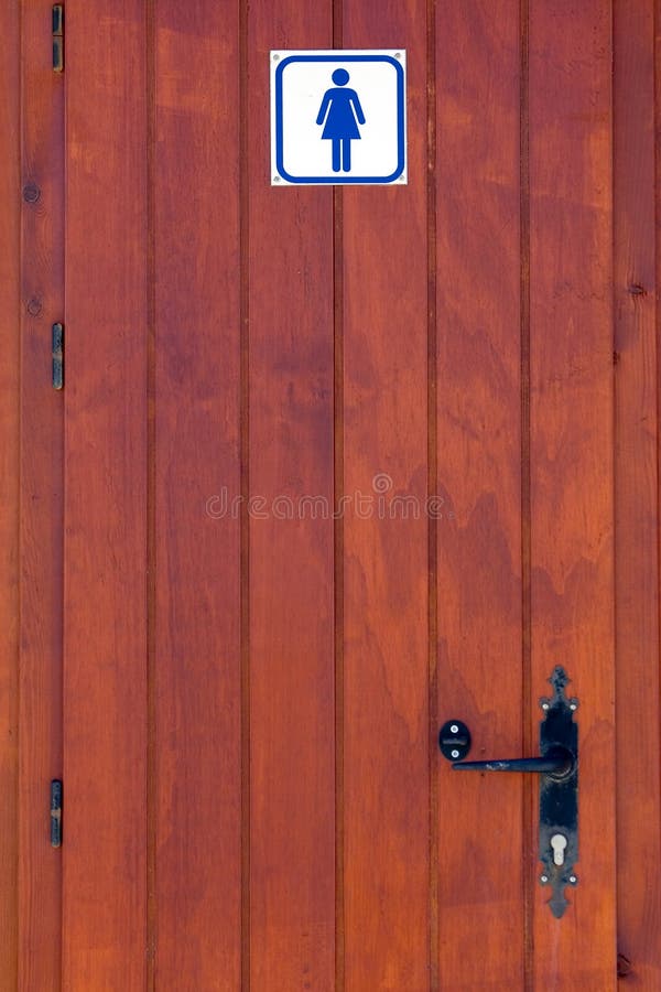 Portello di legno della toletta delle signore immagine stock libera da diritti
