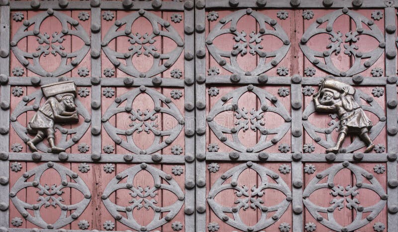 Doors of Santa Maria del Mar main entrance with stone porters or