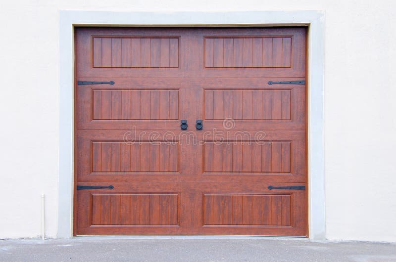 Automobile car garage doors that are plastic with a fake wood grain. Automobile car garage doors that are plastic with a fake wood grain.
