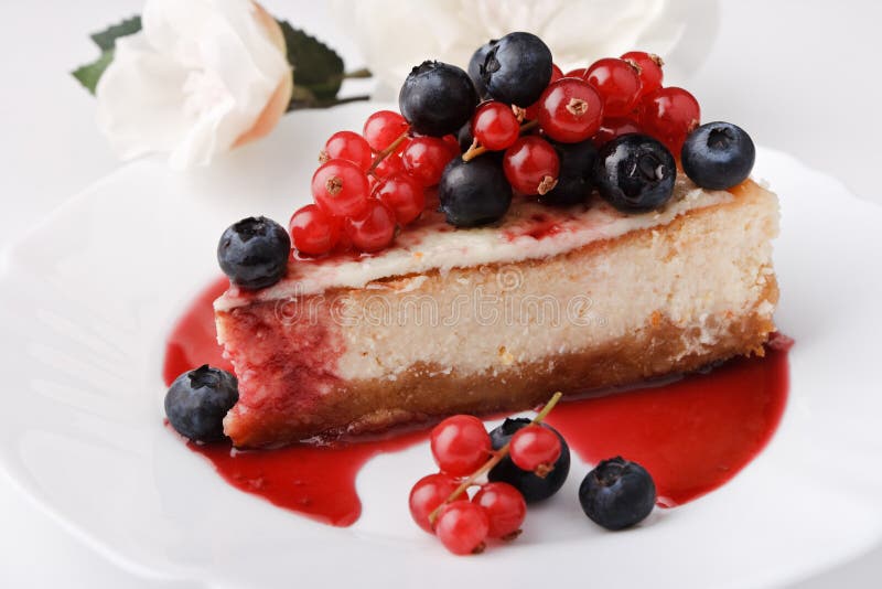 Portion of cheese cake New-York with berries