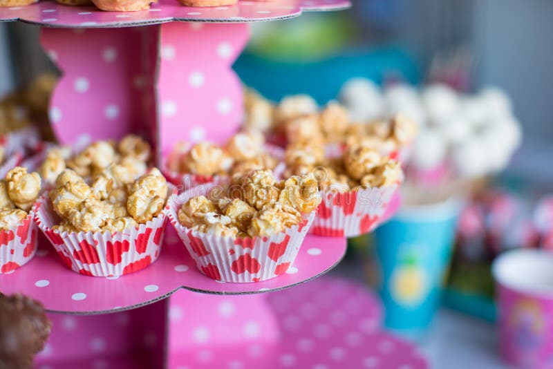Portion popcorn on the children's party on a sweet dessert table. Dessert portions stock images, royalty-free photos and pictures