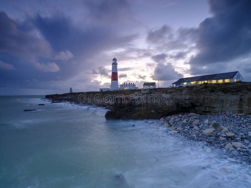 Portland Bill Light house with a stormy sunset stock images Portland Bill Light house with a stormy sunset stock images