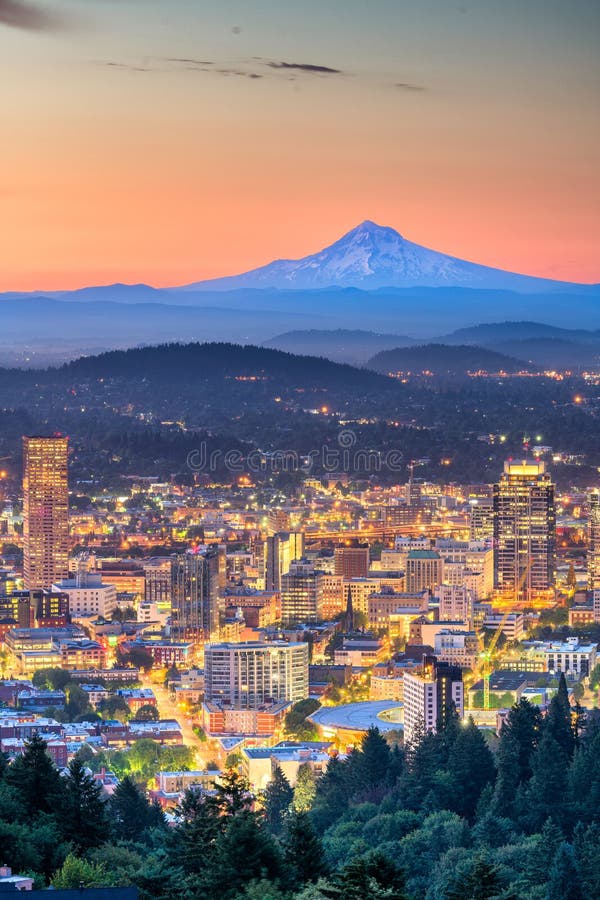 Portland, Oregon, USA downtown skyline with Mt. Hood at dawn. Portland, Oregon, USA downtown skyline with Mt. Hood at dawn