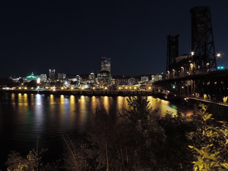 Downtown Portland, Oregon skyline from the Willamette River at night. Koin tower portland oregon stock images, royalty-free photos and pictures