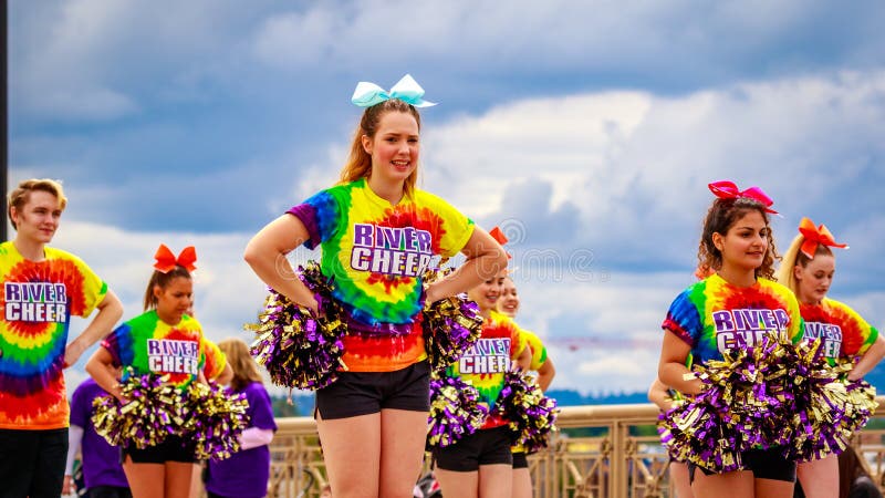 Portland, Oregon, USA - June 11, 2016: Columbia River High School Marching Band in the Grand Floral Parade during Portland Rose Festival 2016. Portland, Oregon, USA - June 11, 2016: Columbia River High School Marching Band in the Grand Floral Parade during Portland Rose Festival 2016.