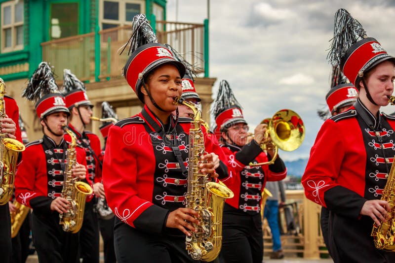 Portland, Oregon, USA - June 8, 2019: Oregon City High School Marching Band in the Grand Floral Parade, during Portland Rose Festival 2019. Portland, Oregon, USA - June 8, 2019: Oregon City High School Marching Band in the Grand Floral Parade, during Portland Rose Festival 2019